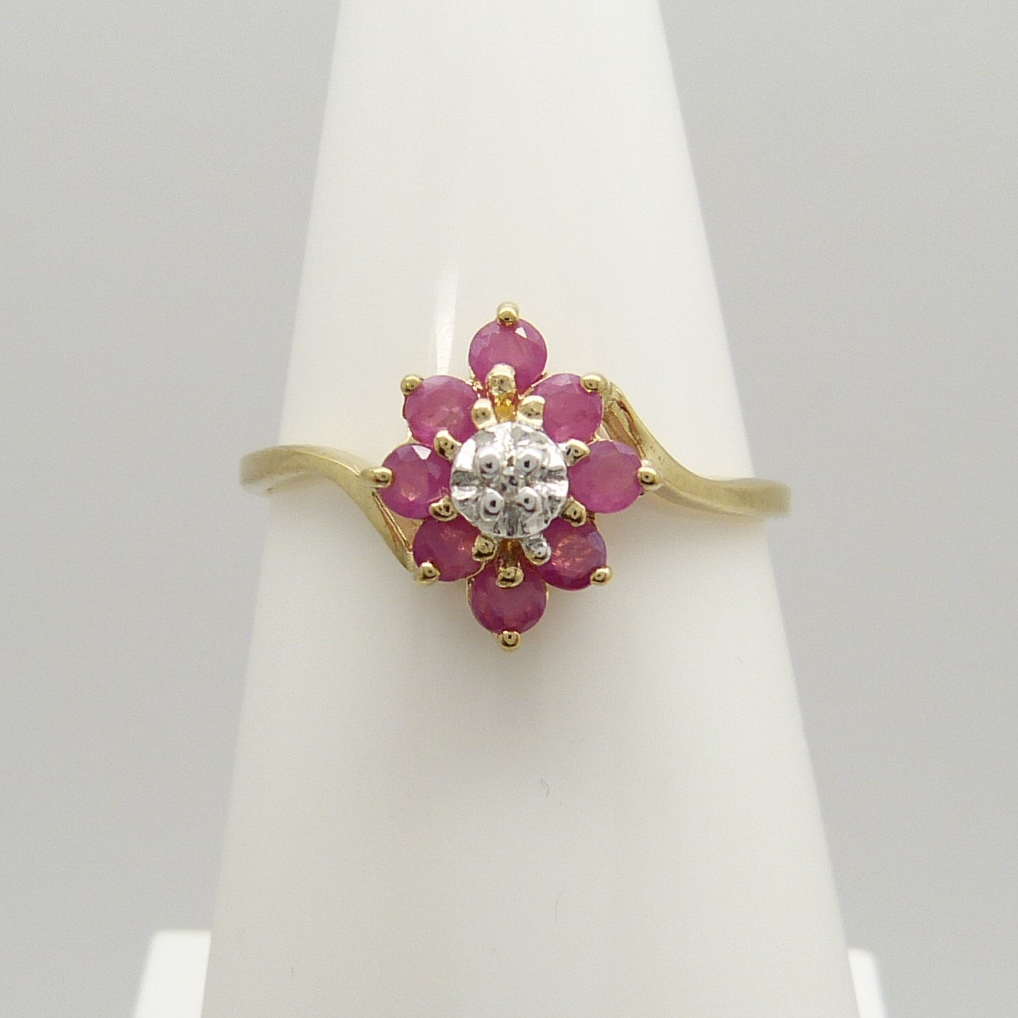 A Ruby and Diamond cluster dress ring in 9ct yellow Gold - Image 2 of 6