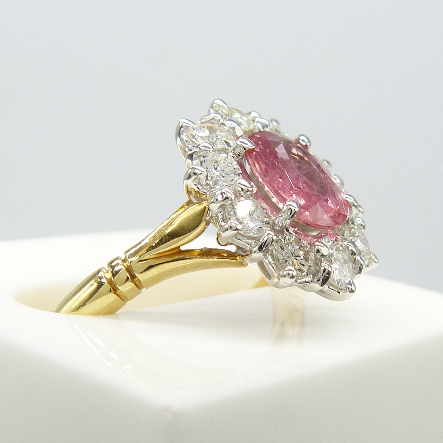 A pinkish-red natural Ruby and Diamond cluster ring in 18ct yellow and white Gold - Image 2 of 10