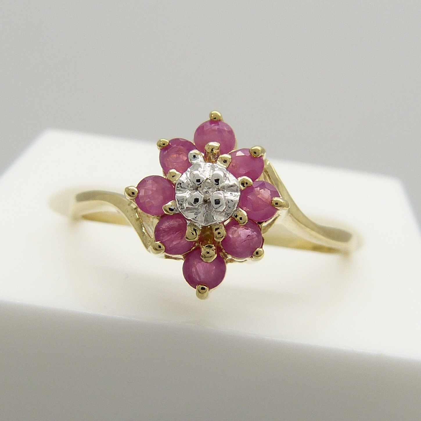 A Ruby and Diamond cluster dress ring in 9ct yellow Gold - Image 6 of 6