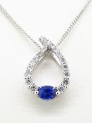 18ct (750) White Gold Open 0.32ct Sapphire & 0.24ct Diamond Pendant on Curb Chain - 18"