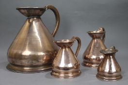 Set of 4 Antique Graduated Copper Jugs