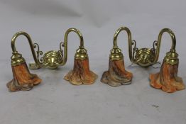 Pair of Two Arm Brass Wall Lights with Amber Shades