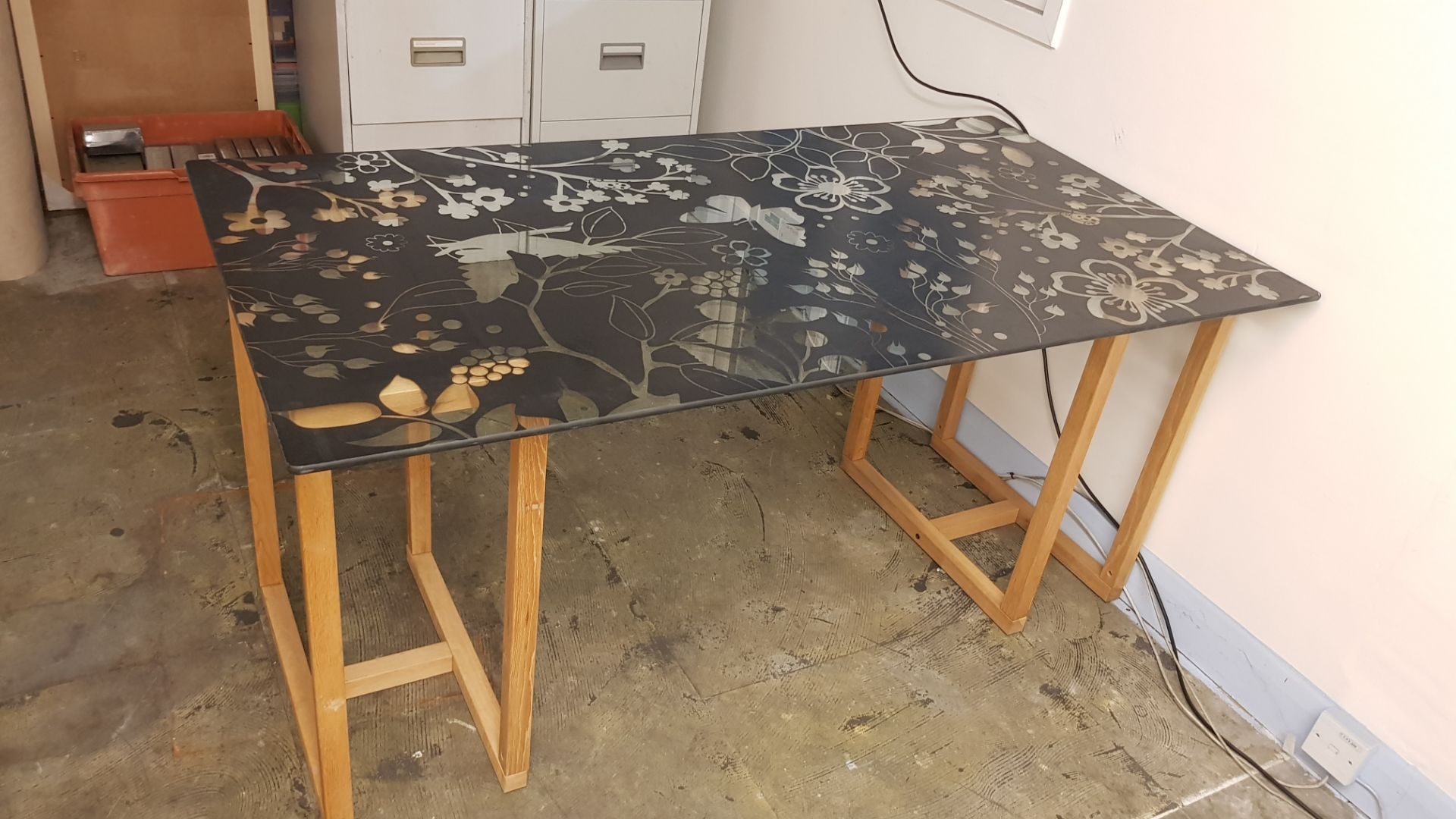 1x Decorative Floral Black Glass Table Top With Wooden Legs. (W150x D80x H72cm)