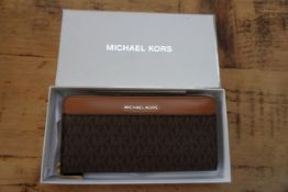 Michael Kors Jet Set Pocket Zip Around Purse Brown