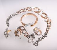 7-teiliges Swarovski-Konvolut aus der Kollektion "Bound", bestehend aus: 2 Ringen, 1 Paar Ohrringen,