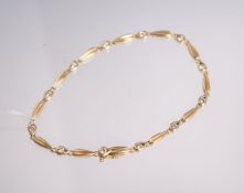 Armband 750 GG, m. 12 Brillanten von zus. ca. 0.6 ct, diese in mittlerem Farb- u. hohem