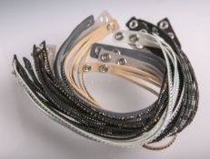 Konvolut von 9 Swarovski-Armbändern aus der Kollektion "Slake", Alcantara m. Besatz aus mehrfarbigen