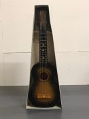 A boxed vintage ukulele