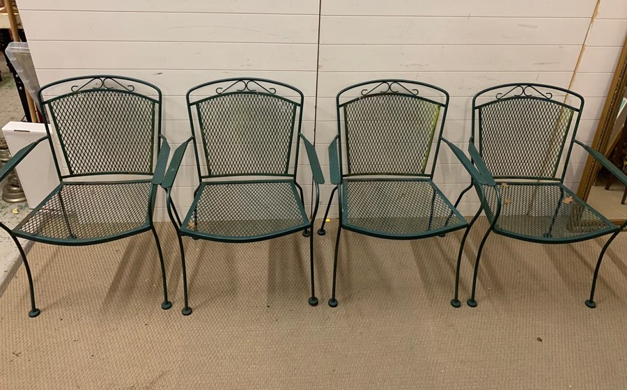 Four metal garden chairs