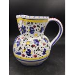 An hand painted vintage Deruta pitcher
