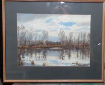 A pair of watercolours depicting winter lanscapes, signed: 'Ronald Amann', framed and glazed, (27x37