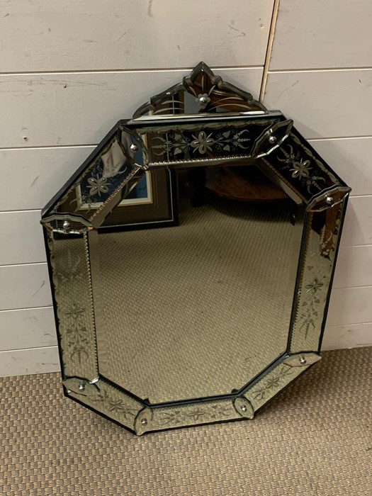 A Venetian mirror (52cm x 76 cm)