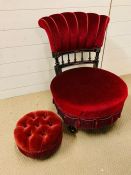 An ebonized and gilt bedroom chair upholstered in red velvet with a shell design back, along with