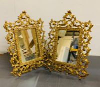 A pair of gilt framed free standing mirrors (30cm x 40cm)