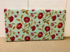 A floral headboard (H104cm W103cm)