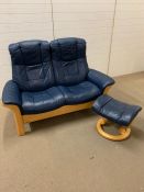 A Ekornes Scandinavian Stress less Windsor recliner sofa and foot stool (H107cm W150cm D72cm)