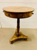 A William IV walnut drum table with segmented top (H69cm Dia 46cm
