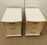 A pair of bedside chest of drawers (H50cm W34cm D44cm)