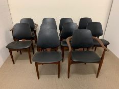 Eight E-On chairs and two carvers in teak with black seat pads and back