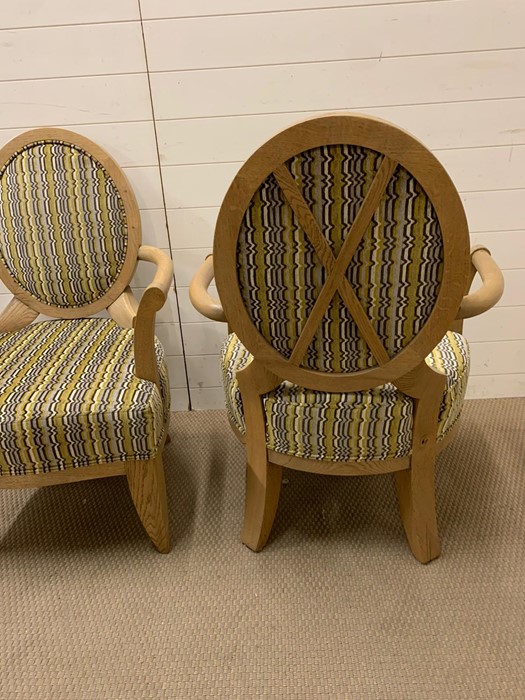 A pair of open armchairs on oak frames and circular backs (66 cm wide x 98 cm high and seat height - Image 2 of 4