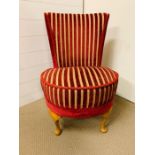An red and striped upholstered bedroom chair on cabriole legs (H77cm)