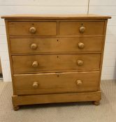 An Antique Pine two over three chest of drawers. (H101cm W100cm D49cm)