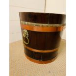 A George III Style mahogany and brass bound peat bucket (30 cm H)