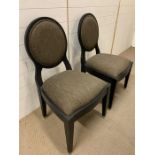 Two bedroom chairs by PIERRE CRONJE with olive green seat pads