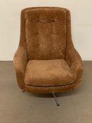 A Mid Century rotating lounge chair with button back with original good condition fabric