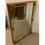 A large gilt framed mirror (96 h x 69cm )