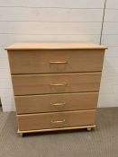 A modern chest of drawers on castors (H90cm W81cm D42cm)