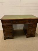 A Pedestal Desk with green leather top (120 cm x 59cm x 79cm)