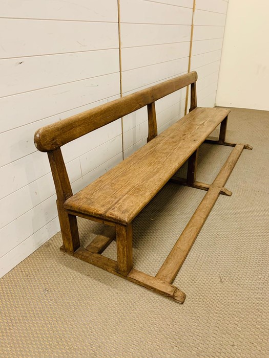 A Victorian pine school pew (H64cm W190cm D63cm) - Image 2 of 3