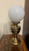 A brass oil fill lamp