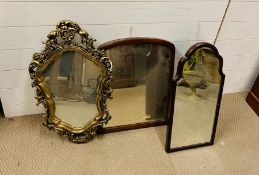 A selection of mirrors, two wall mirrors and one free standing mirror