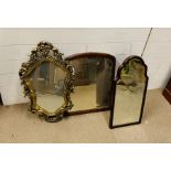 A selection of mirrors, two wall mirrors and one free standing mirror