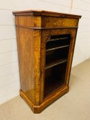 A Victorian Walnut inlaid Music Cabinet with open unglazed door opening to reveal shelving with