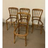 A Set of four giltwood ballroom chairs, no seat pads.