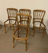 A Set of four giltwood ballroom chairs, no seat pads.