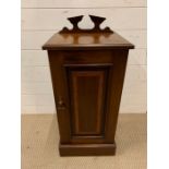 A Mahogany inlaid pot cupboard.