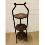 A Mahogany inlaid three tiered cake stand