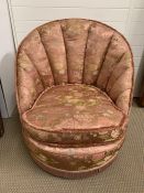 A shell back bedroom or club chair in pink