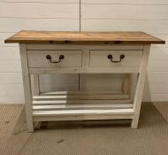 A pine painted kitchen unit/sideboard with two drawers (H76cm W107cm D40cm)