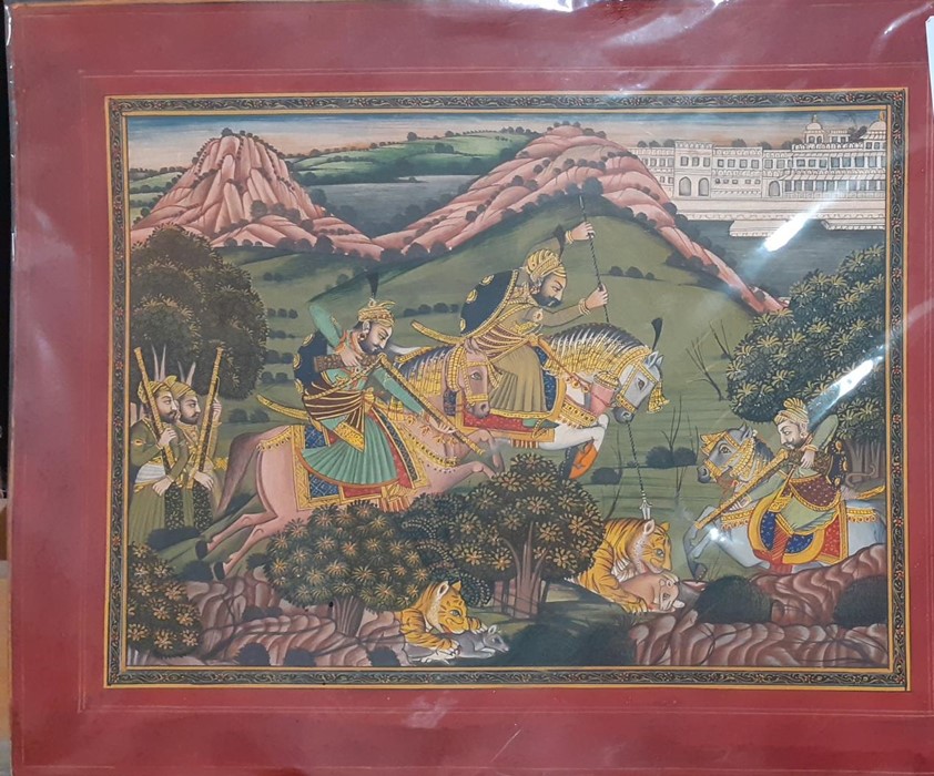 An INDIAN Mewar school miniature painting depicting a Maharajah and courtieurs hunting tigers, (29.