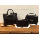 Three designer bags by Coccinelle, Nina Ricci and Mandarina Duck, all with dust covers and clean