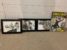 A selection of comic strip posters, framed