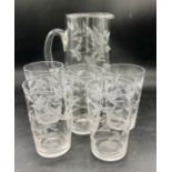 A water jug and five glasses with a bird and fern etching