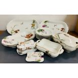 A selection of Haviland Limoges porcelain serving dishes, six shallow bowls and a sauce boat