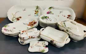 A selection of Haviland Limoges porcelain serving dishes, six shallow bowls and a sauce boat