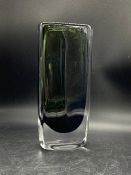 A incased green glass vase signed and numbered to base (Unknown) (H24cm W10cm)